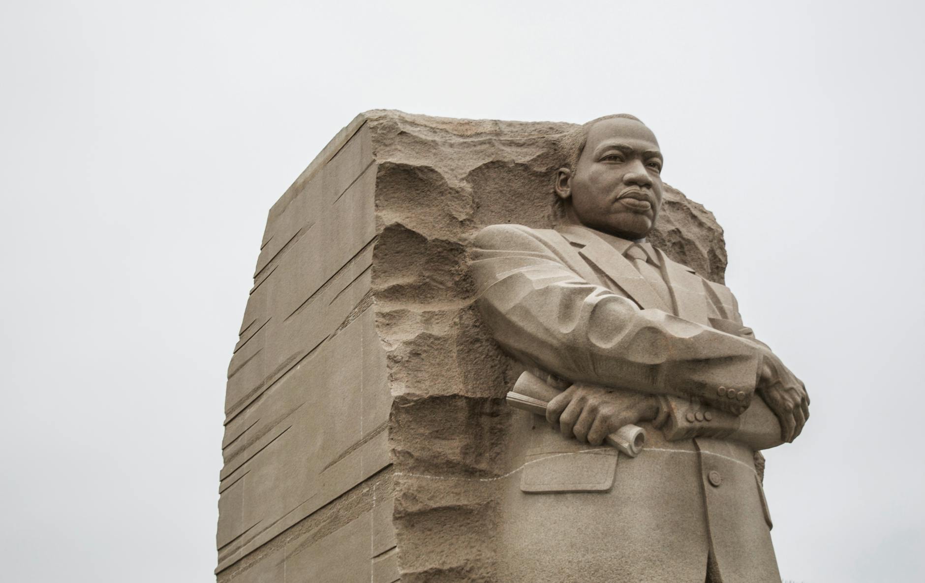 Majestic stone monument of Martin Luther King Jr. in Washington DC, symbolizing civil rights.
